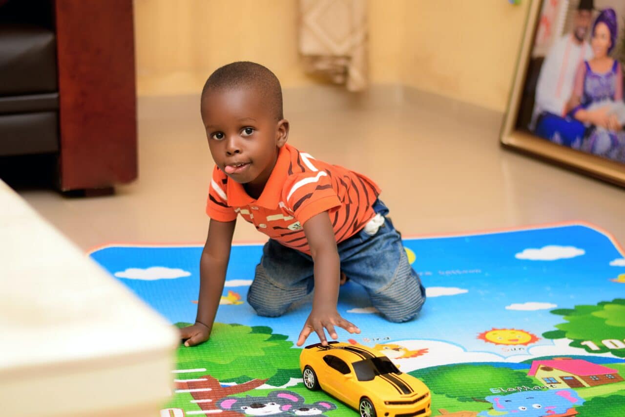 Young boy playing at daycare.