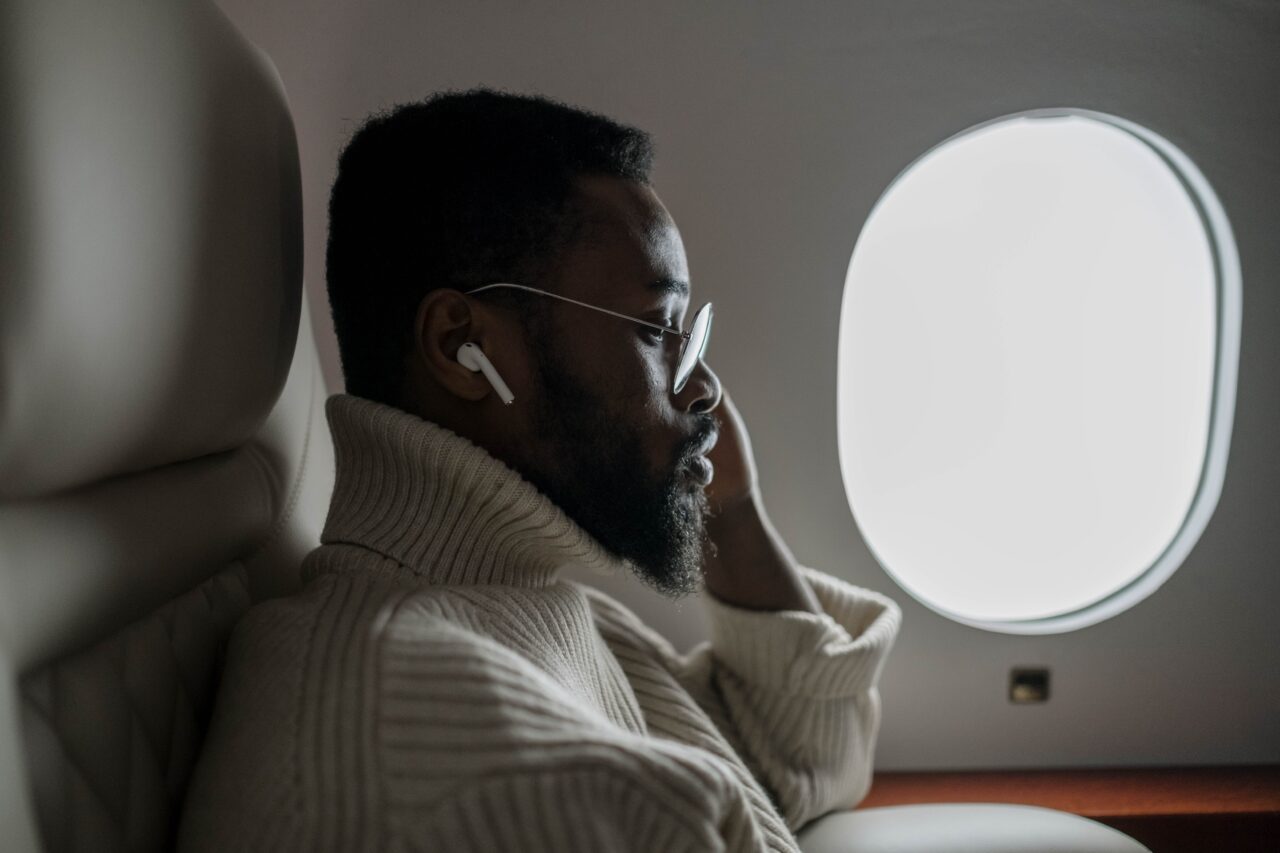 Man flying in an airplane.