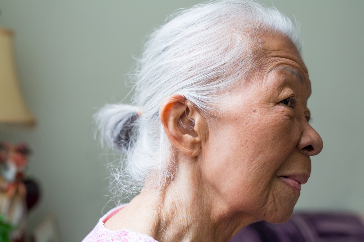 Woman wearing a hearing aid